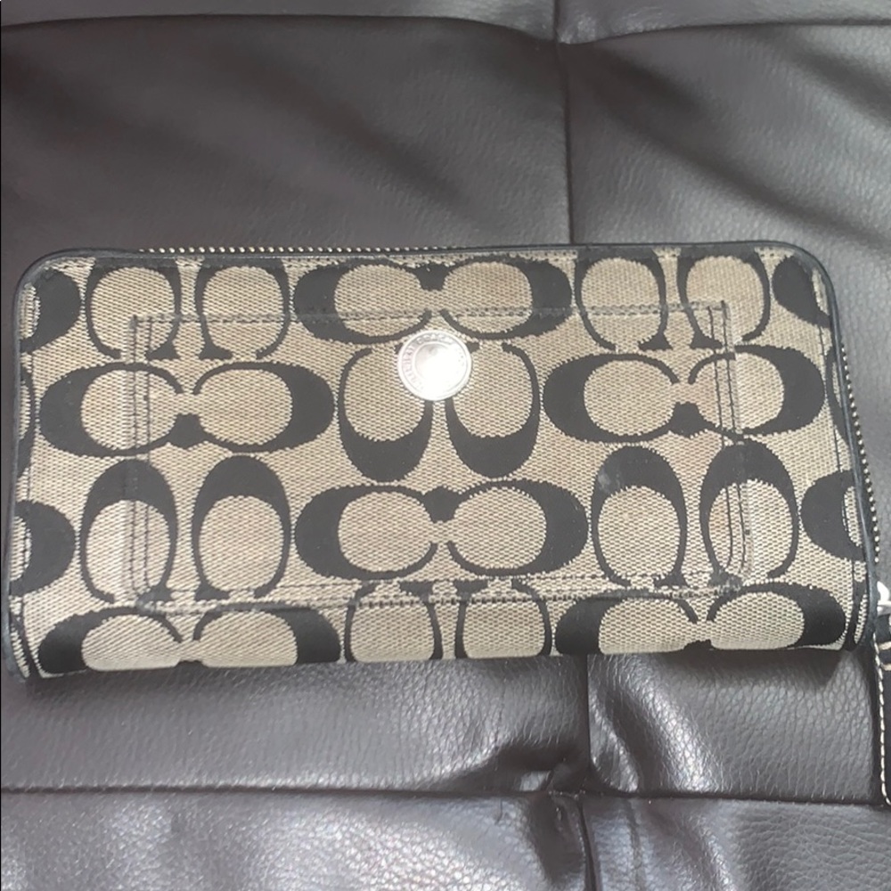 Black and gray coach wallet